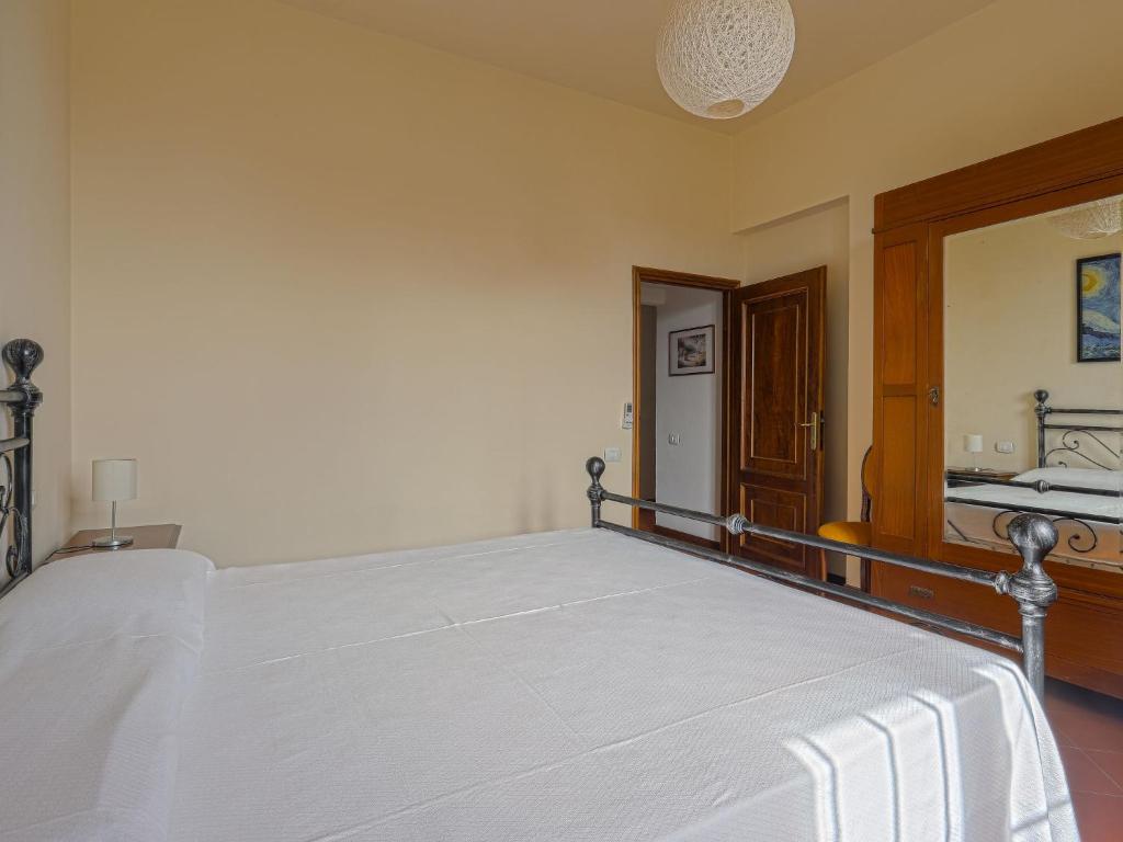 Łóżko lub łóżka w pokoju w obiekcie Holiday Home Casa Alfredo by Interhome