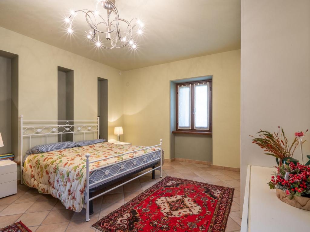 A bed or beds in a room at Holiday Home Castellaio by Interhome