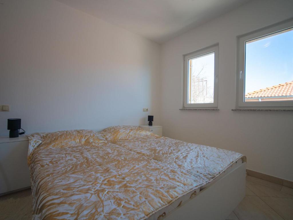 Posteľ alebo postele v izbe v ubytovaní Apartment Martina by Interhome