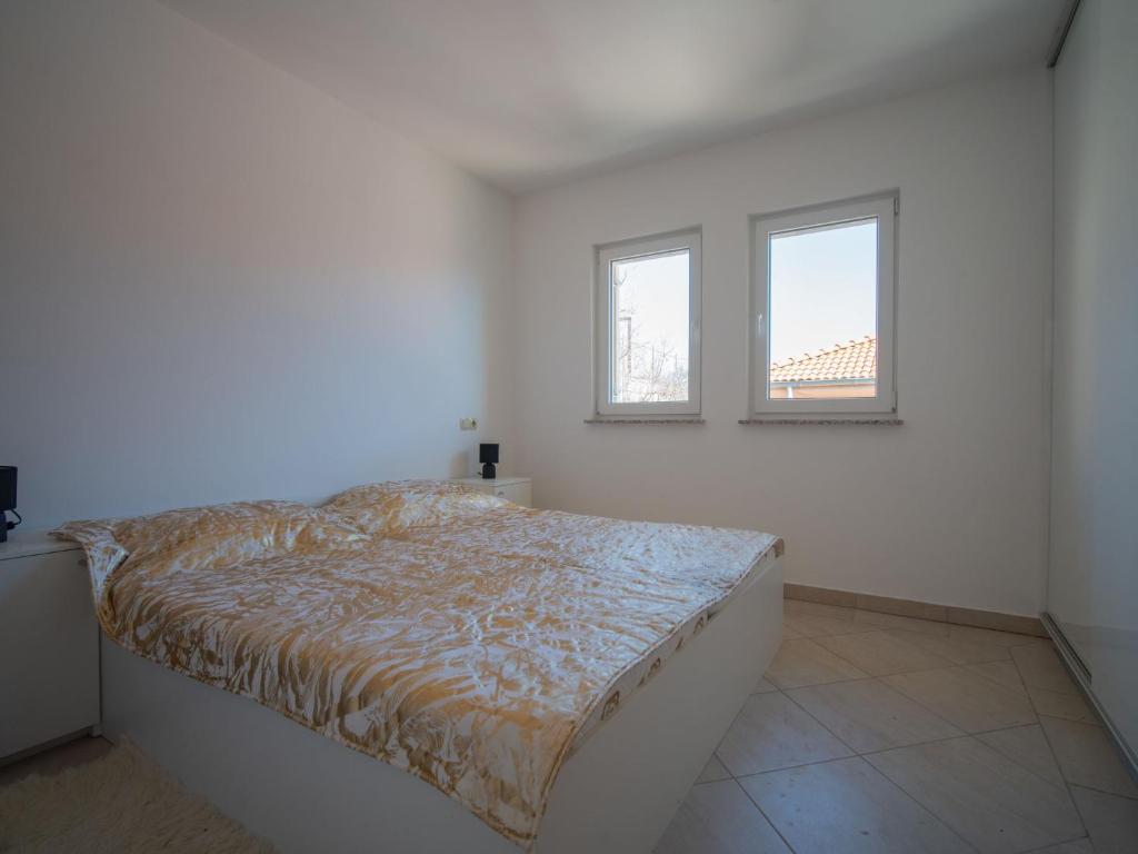 Posteľ alebo postele v izbe v ubytovaní Apartment Martina by Interhome