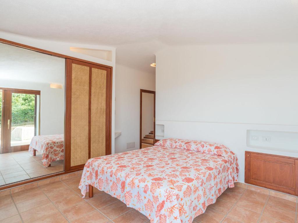 A bed or beds in a room at Villa Malvasia by Interhome
