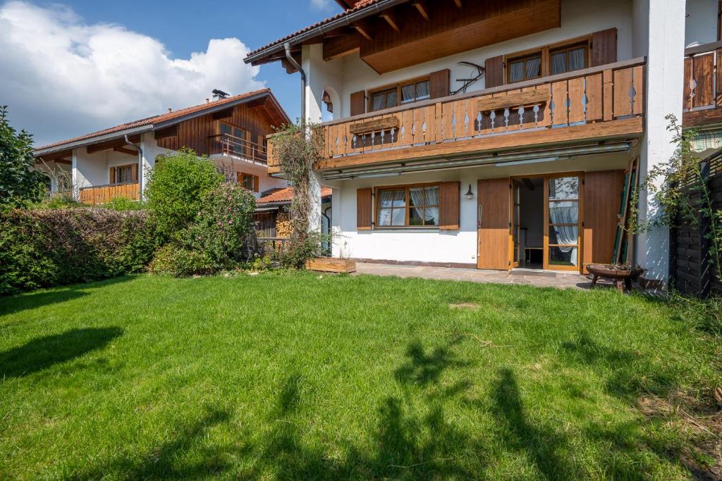 a house with a lawn in front of it at Burgberger Hörnle in Burgberg
