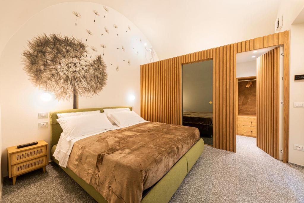A bed or beds in a room at Apartments Florence - Dragomanni Loft with patio