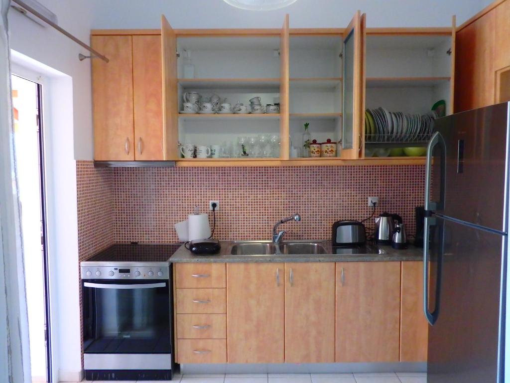 Kuchyň nebo kuchyňský kout v ubytování Ionian Apartment, Sami