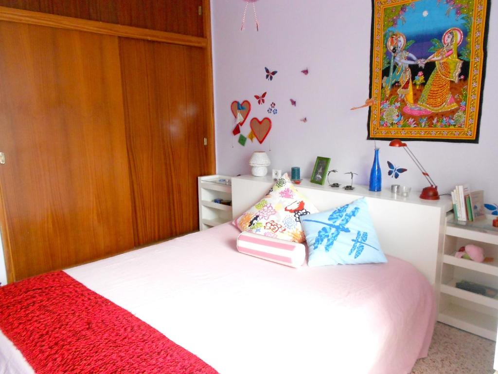 Posteľ alebo postele v izbe v ubytovaní Cozy House in Candelaria, Sea View