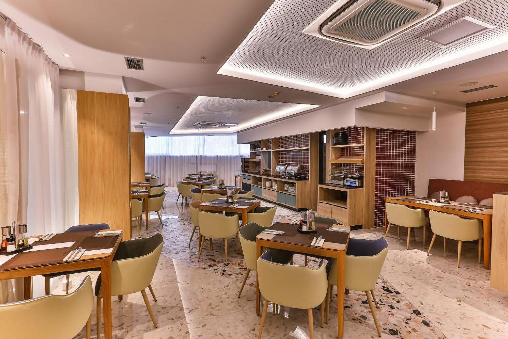 Area soggiorno di Carine Hotel Centar