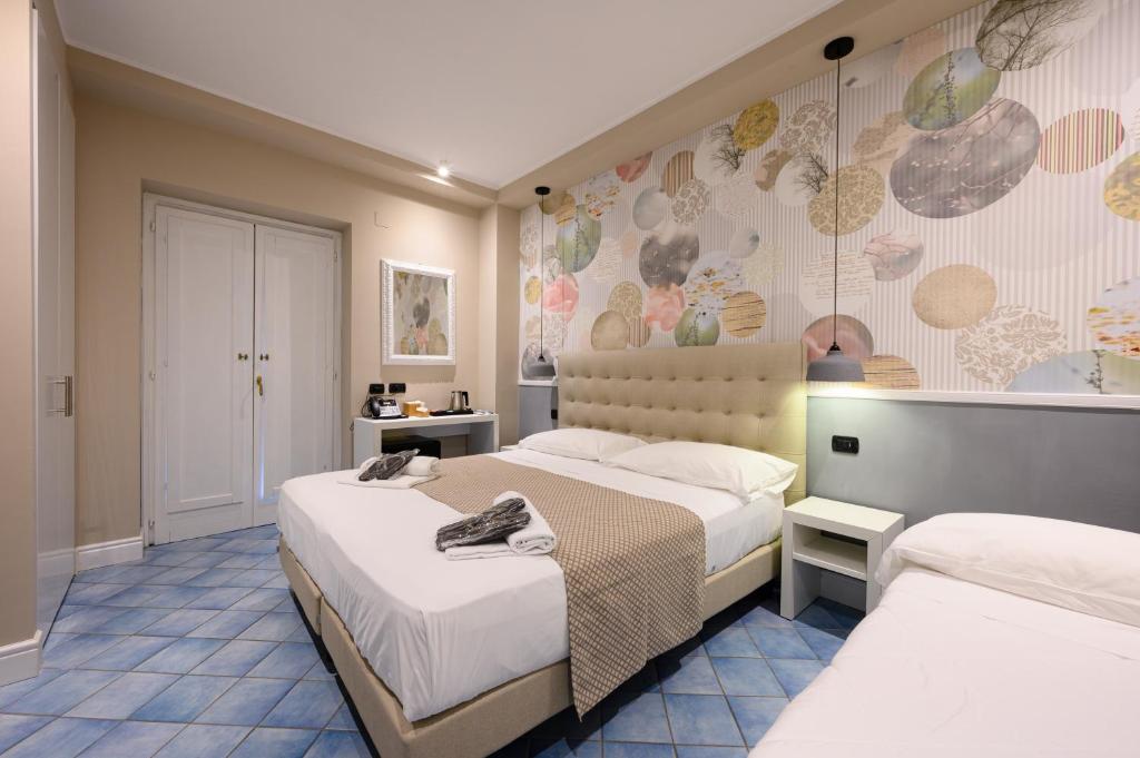 A bed or beds in a room at Hotel Sogaris