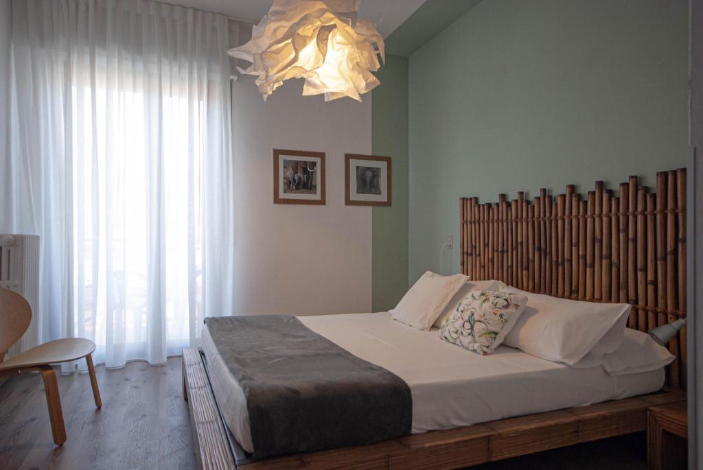 Postel nebo postele na pokoji v ubytování Hotel Peler
