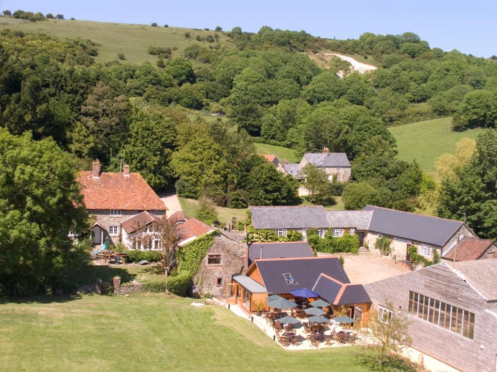 an aerial view of a house with a yard at The Garlic Farm in Sandown