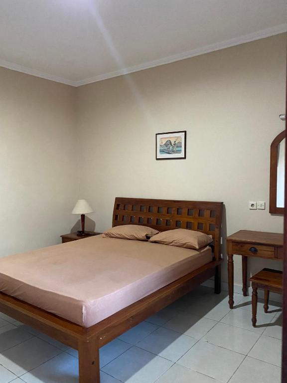 Postel nebo postele na pokoji v ubytování Neys guest house