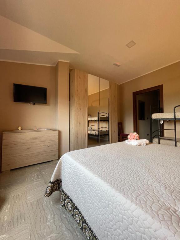 A bed or beds in a room at Divino Bistrot e Relais