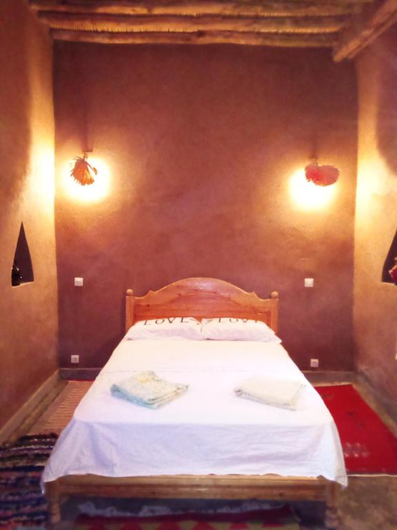 Postel nebo postele na pokoji v ubytování Authentic riad & activities Erg