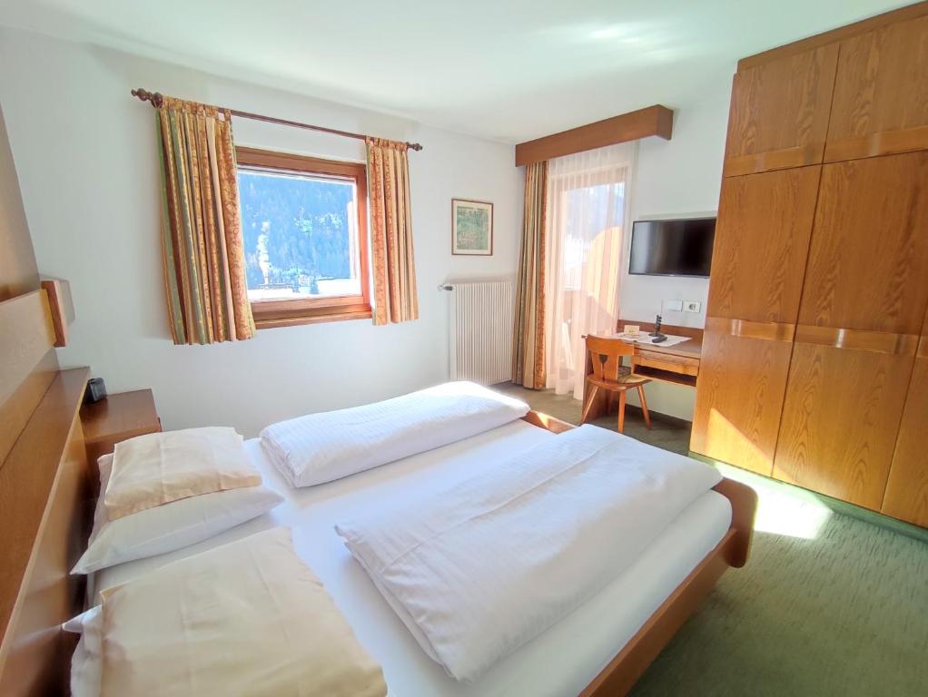 Postel nebo postele na pokoji v ubytování Villa Luise