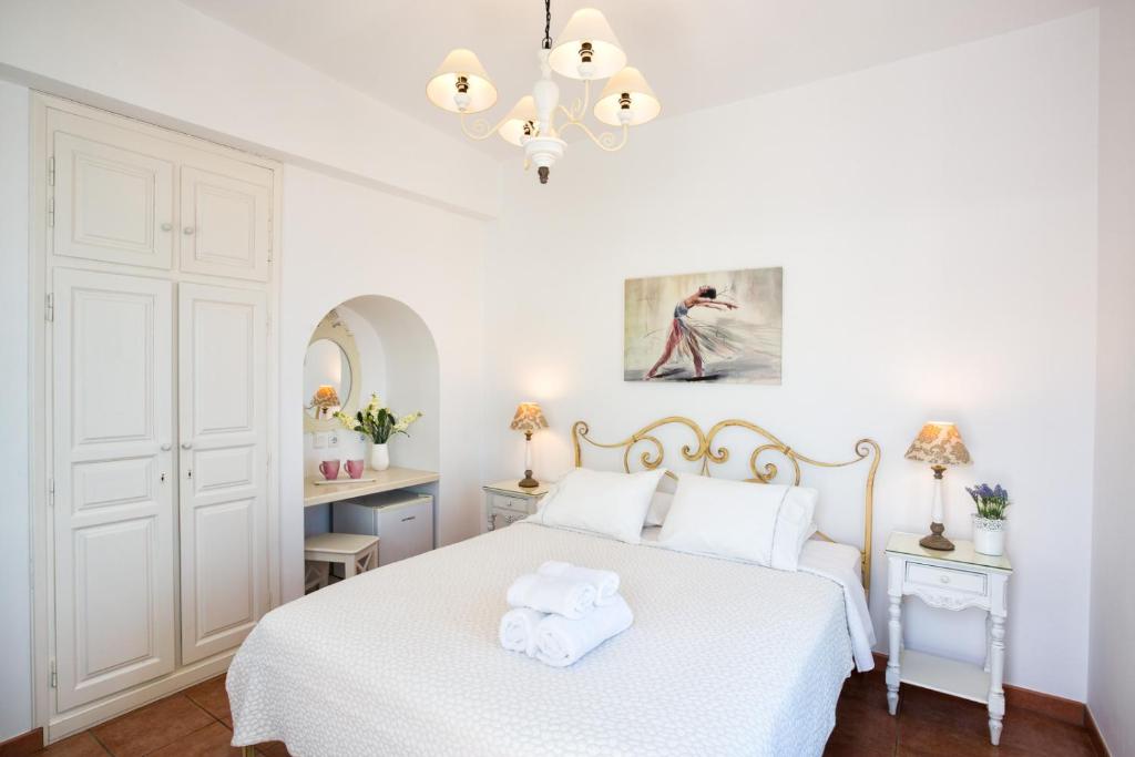 Posteľ alebo postele v izbe v ubytovaní Hotel Odysseus