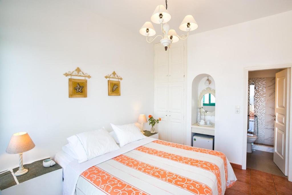 Posteľ alebo postele v izbe v ubytovaní Hotel Odysseus