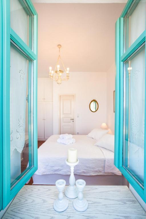 Posteľ alebo postele v izbe v ubytovaní Hotel Odysseus