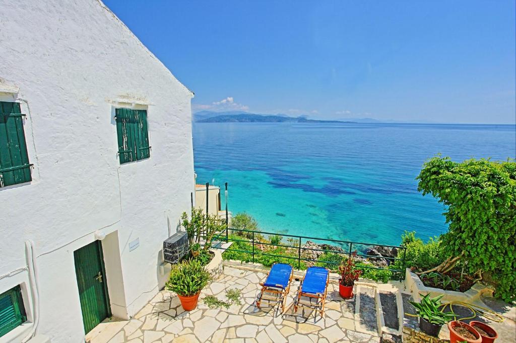 a view of the ocean from a building at Sea Front Studio Alexandra in Nisakion
