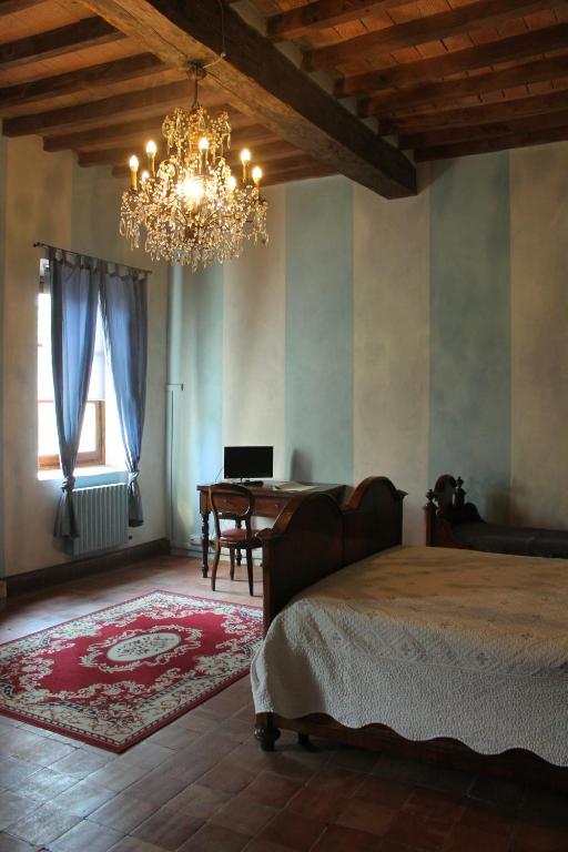 A bed or beds in a room at Room and Breakfast Torre