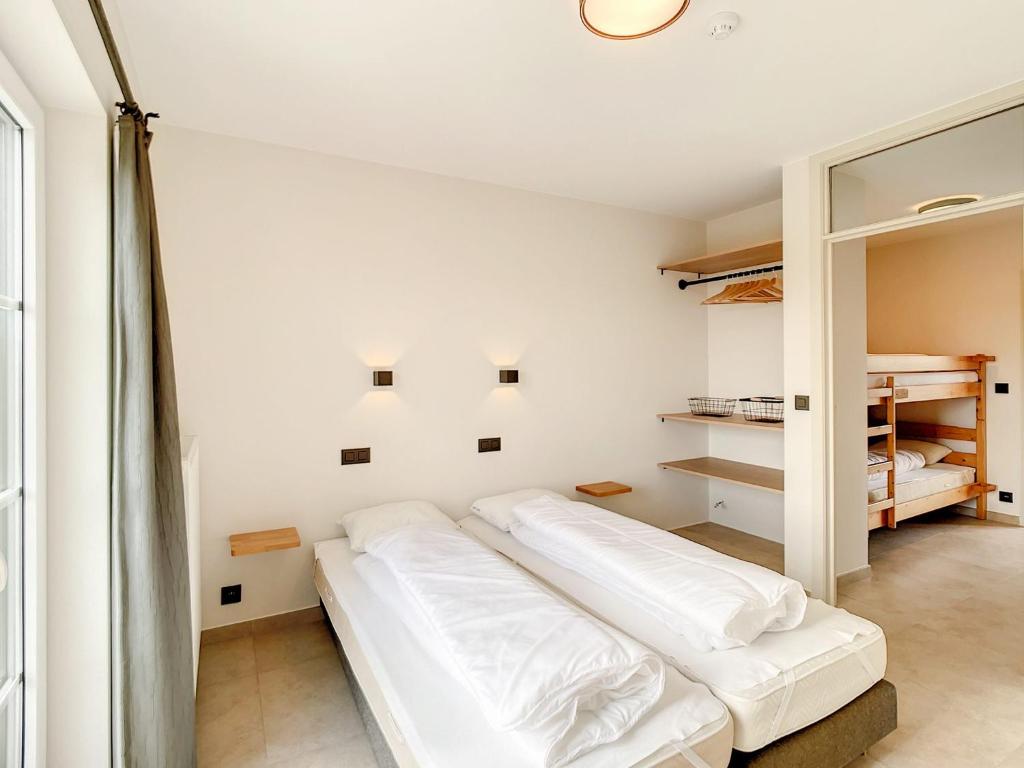Postel nebo postele na pokoji v ubytování Hoeve Langhof