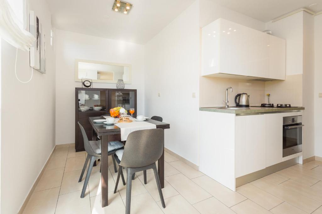 Kuchyň nebo kuchyňský kout v ubytování Apartment Starfish Pula