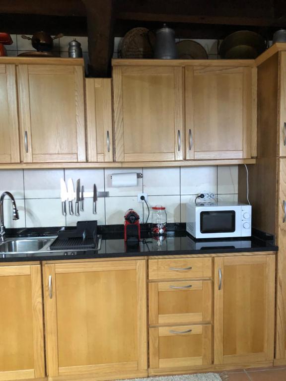 Kuchyň nebo kuchyňský kout v ubytování Casa Dos Cabritos
