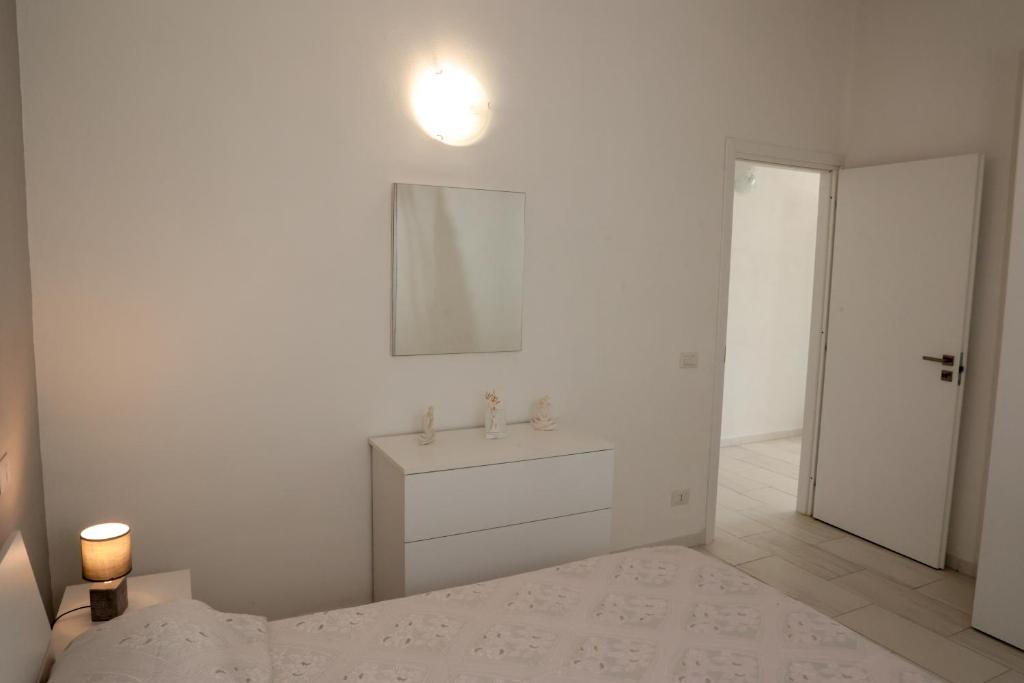 A bed or beds in a room at Villa Bella