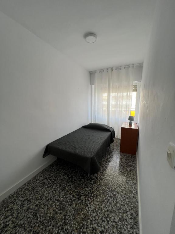 Posteľ alebo postele v izbe v ubytovaní COSTA DAURADA APARTAMENTS - Molins II
