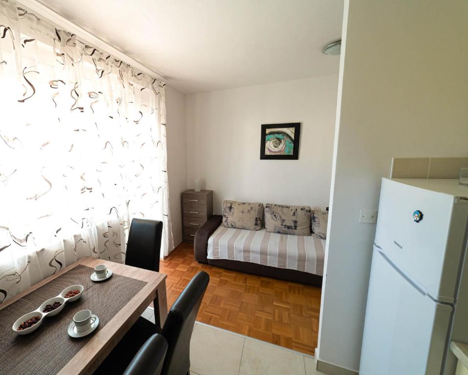 Postel nebo postele na pokoji v ubytování Apartments M&S