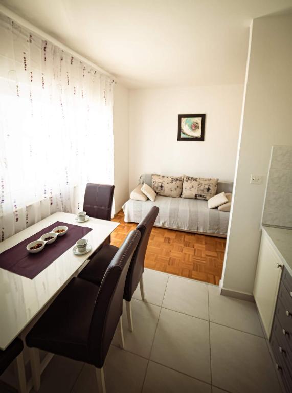 Postel nebo postele na pokoji v ubytování Apartments M&S