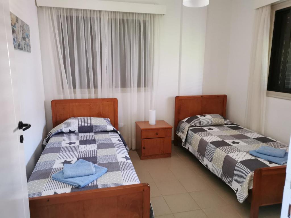 Postel nebo postele na pokoji v ubytování Seaclusion Vacation Villa