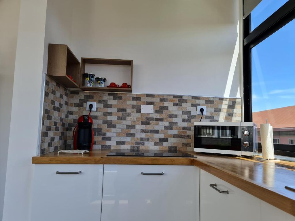 Kuchyňa alebo kuchynka v ubytovaní Yumboflat Two Bedroom Apartment