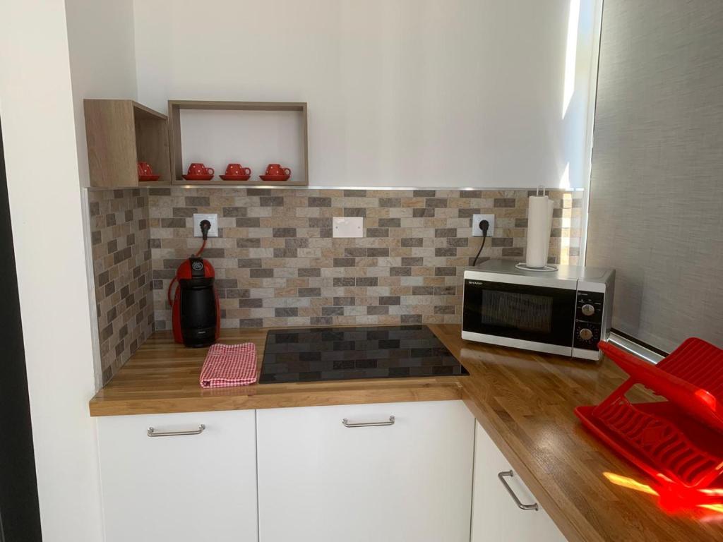 Kuchyňa alebo kuchynka v ubytovaní Yumboflat Two Bedroom Apartment
