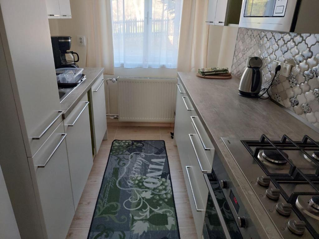 Kuchyň nebo kuchyňský kout v ubytování Apartmány U Mariánské kaple