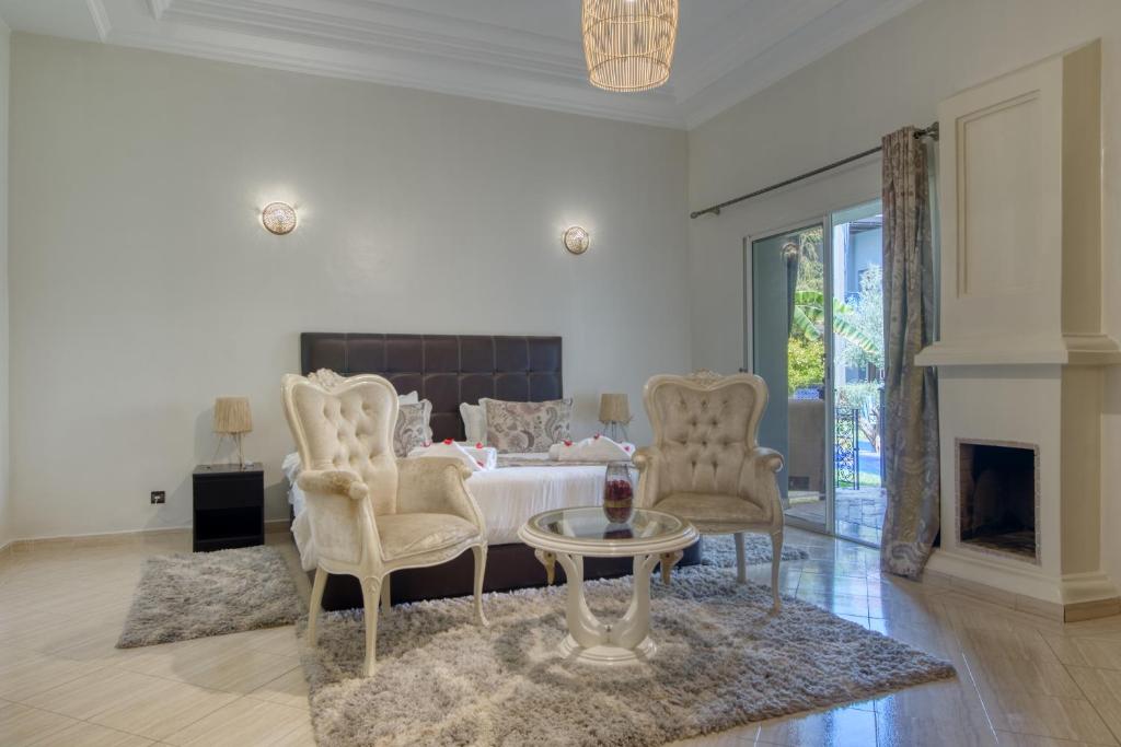 Posezení v ubytování Villas 95 Appart'Hôtel