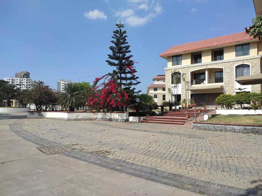 a christmas tree in the middle of a street at 1BHK AC Service Apartment 103 in Pune