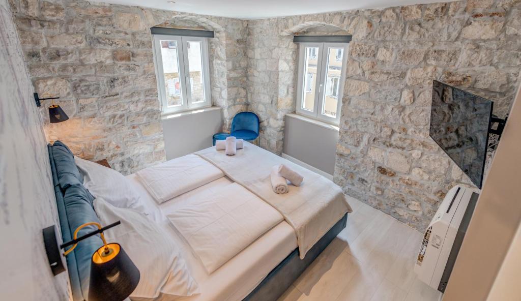 Posteľ alebo postele v izbe v ubytovaní Palace Luxury Retreat