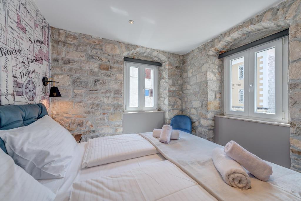 Posteľ alebo postele v izbe v ubytovaní Palace Luxury Retreat