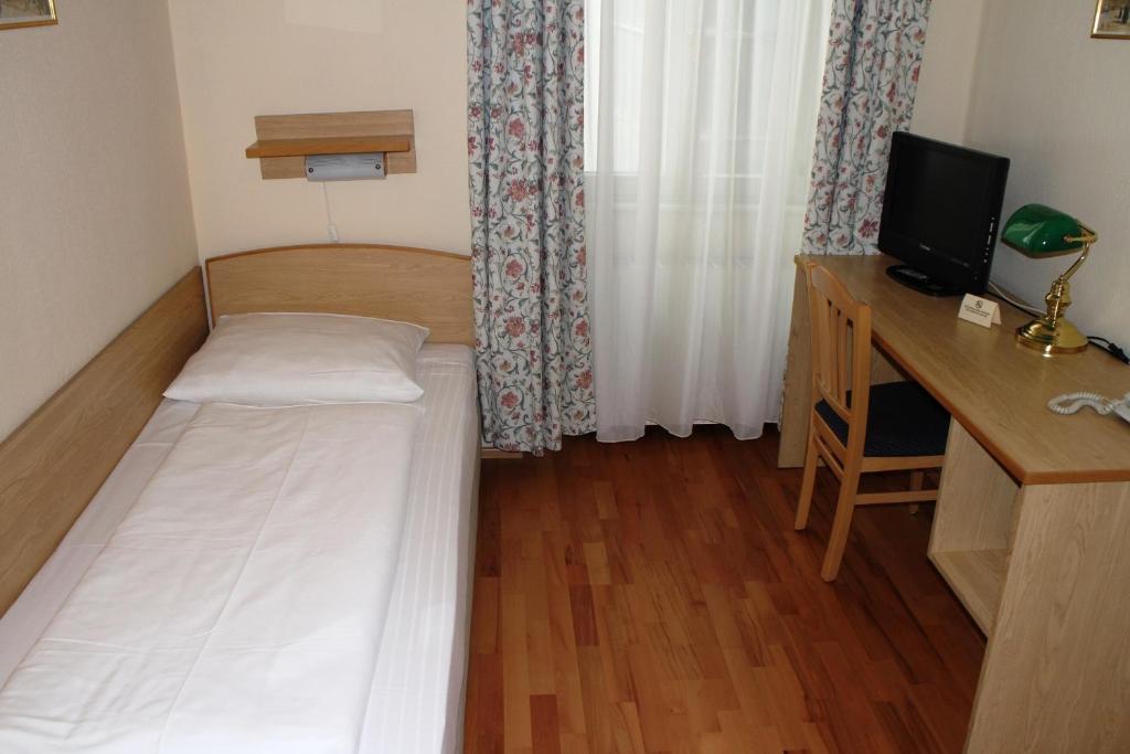 TV a/nebo společenská místnost v ubytování Hotel Graf Stadion
