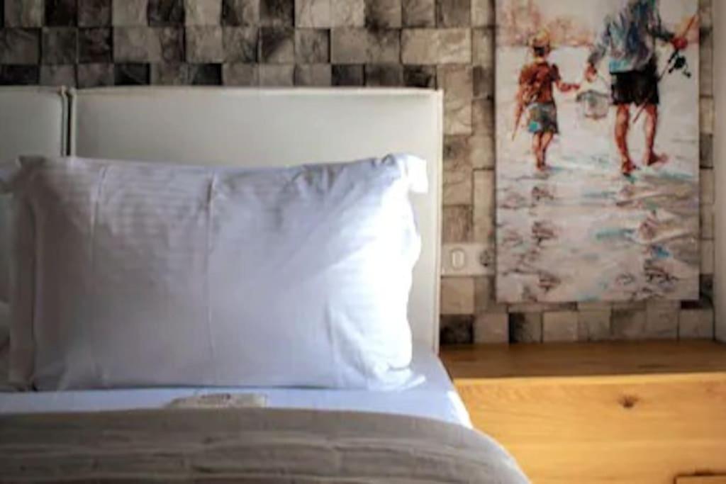Posteľ alebo postele v izbe v ubytovaní Aurora Apartment (Pera Gialos)