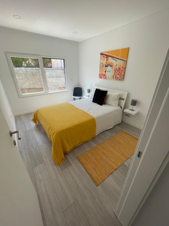 Postel nebo postele na pokoji v ubytování Holiday house Miramar by Ericeira