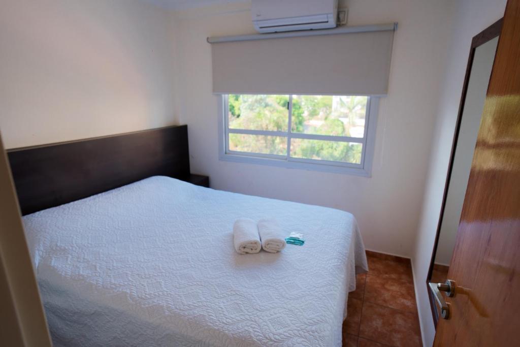 Postel nebo postele na pokoji v ubytování Regia Apartamentos Posadas