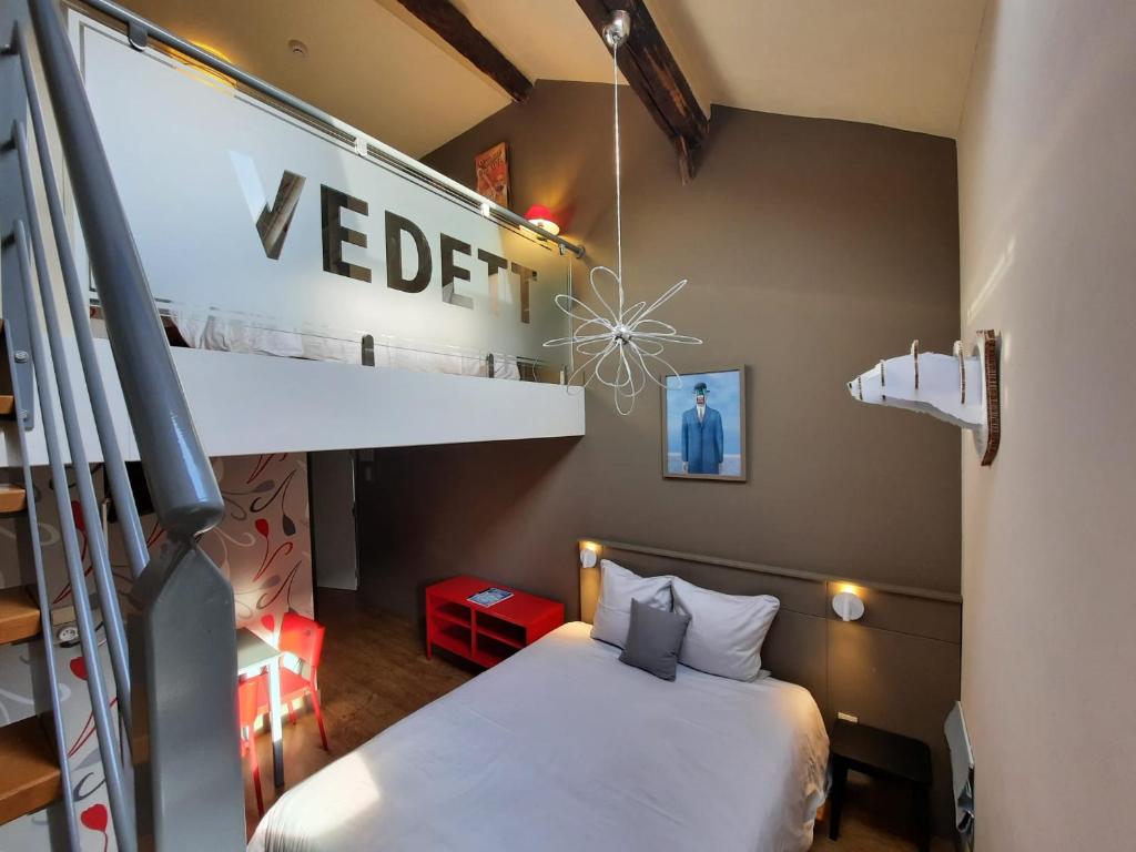 Postel nebo postele na pokoji v ubytování La Vieille Forge B&B