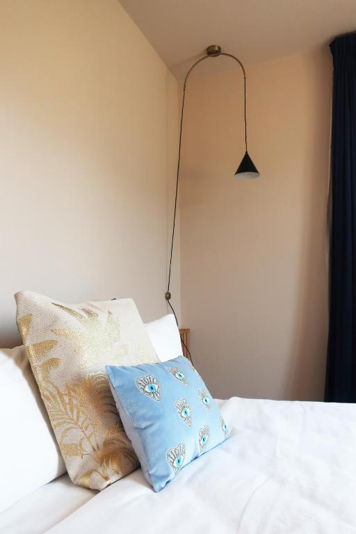 Een bed of bedden in een kamer bij Picobello Lago