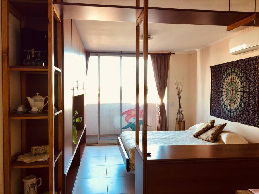 Ein Bett oder Betten in einem Zimmer der Unterkunft Balcones del boulevard