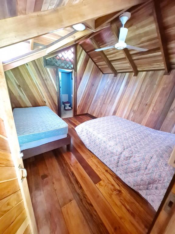 Postel nebo postele na pokoji v ubytování Casa Numú