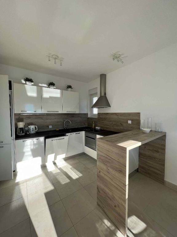 Kuchyňa alebo kuchynka v ubytovaní Apartment in Crikvenica 42636