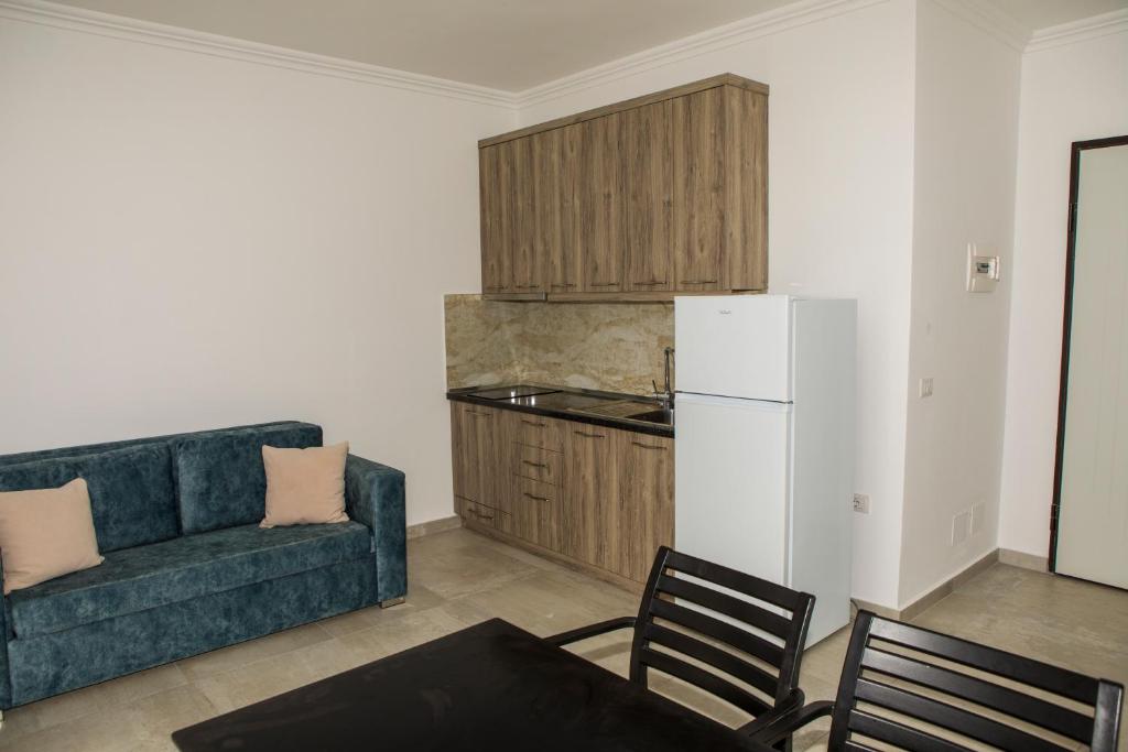 Kuchyň nebo kuchyňský kout v ubytování Soluna Apartments