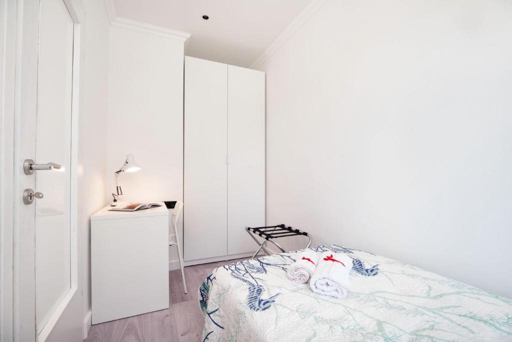 Posteľ alebo postele v izbe v ubytovaní Apartment Ella