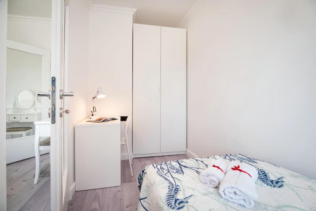 Posteľ alebo postele v izbe v ubytovaní Apartment Ella