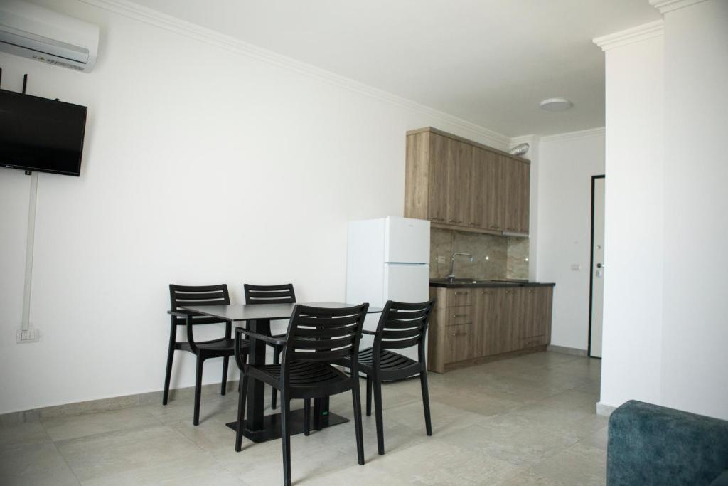 Kuchyň nebo kuchyňský kout v ubytování Soluna Apartments